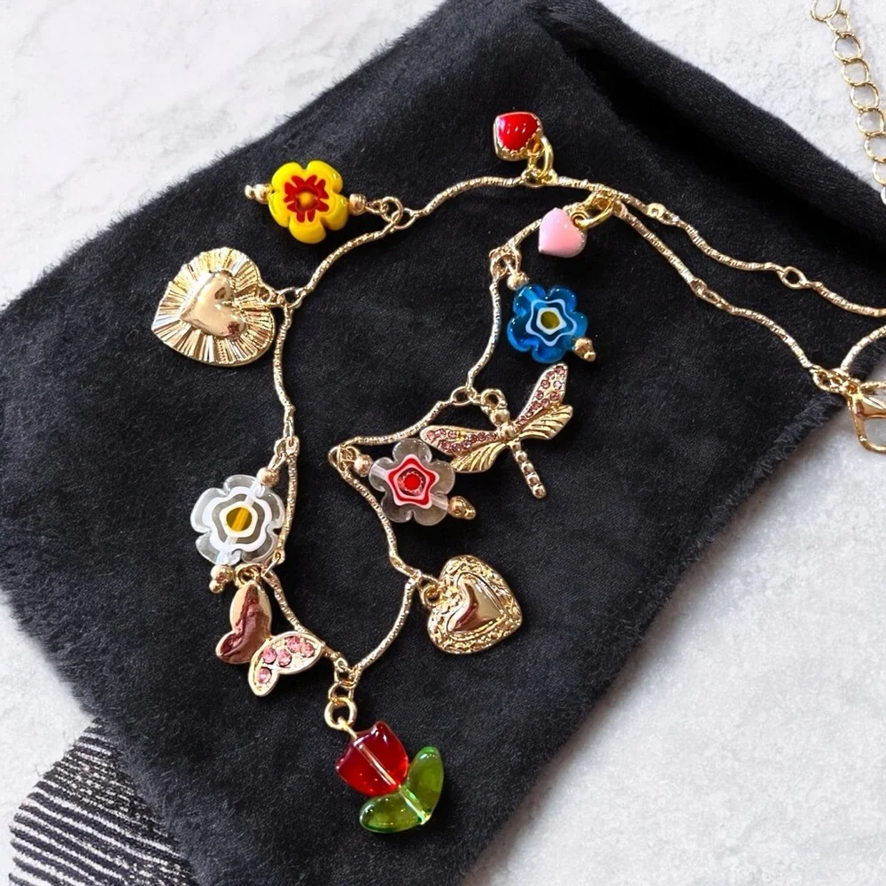 Gold and Red toned Charm Necklace glass rhinestones enamel tulip flower hearts